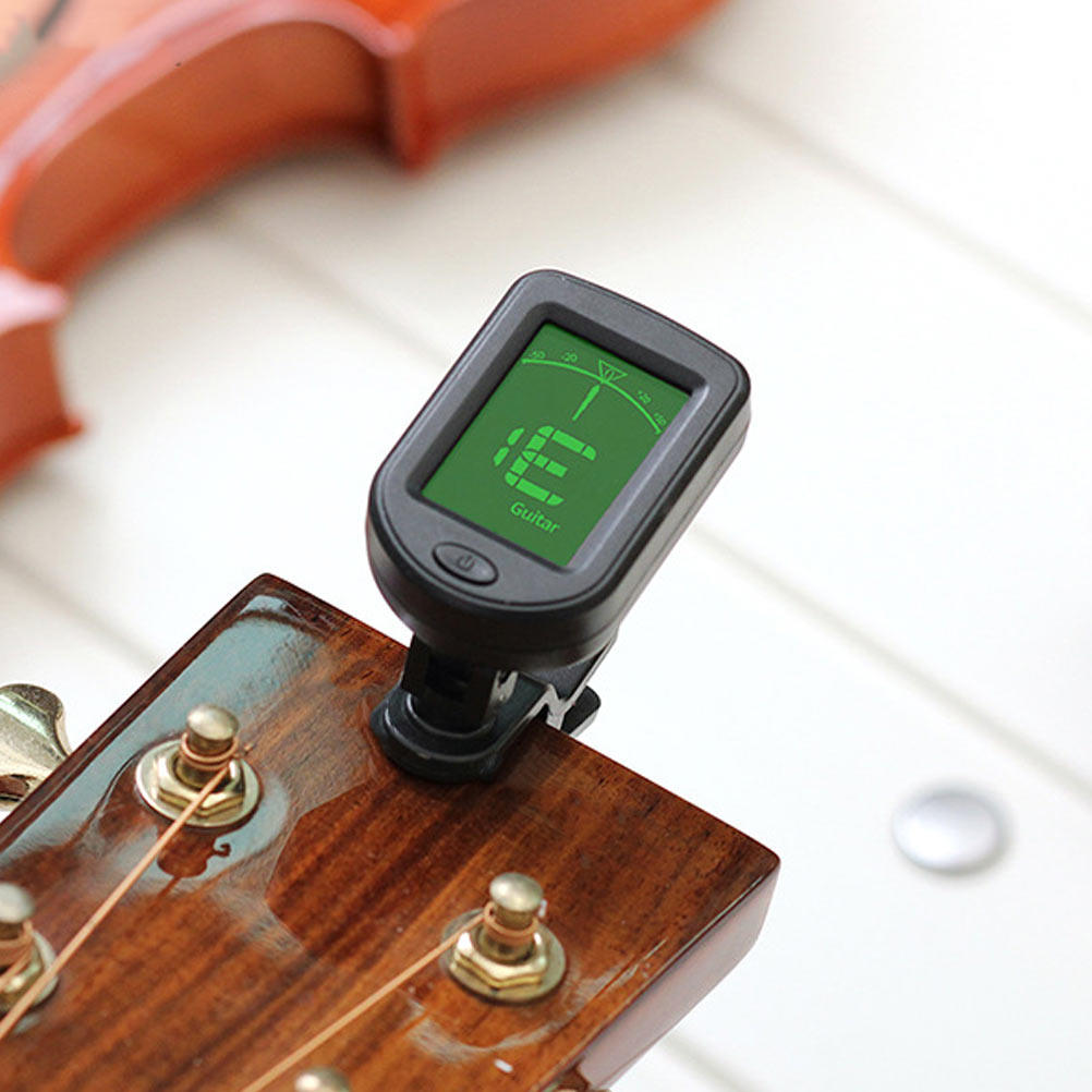 Universal Tuner for Guitar Vio - Violin Musical Instrument recension och pris